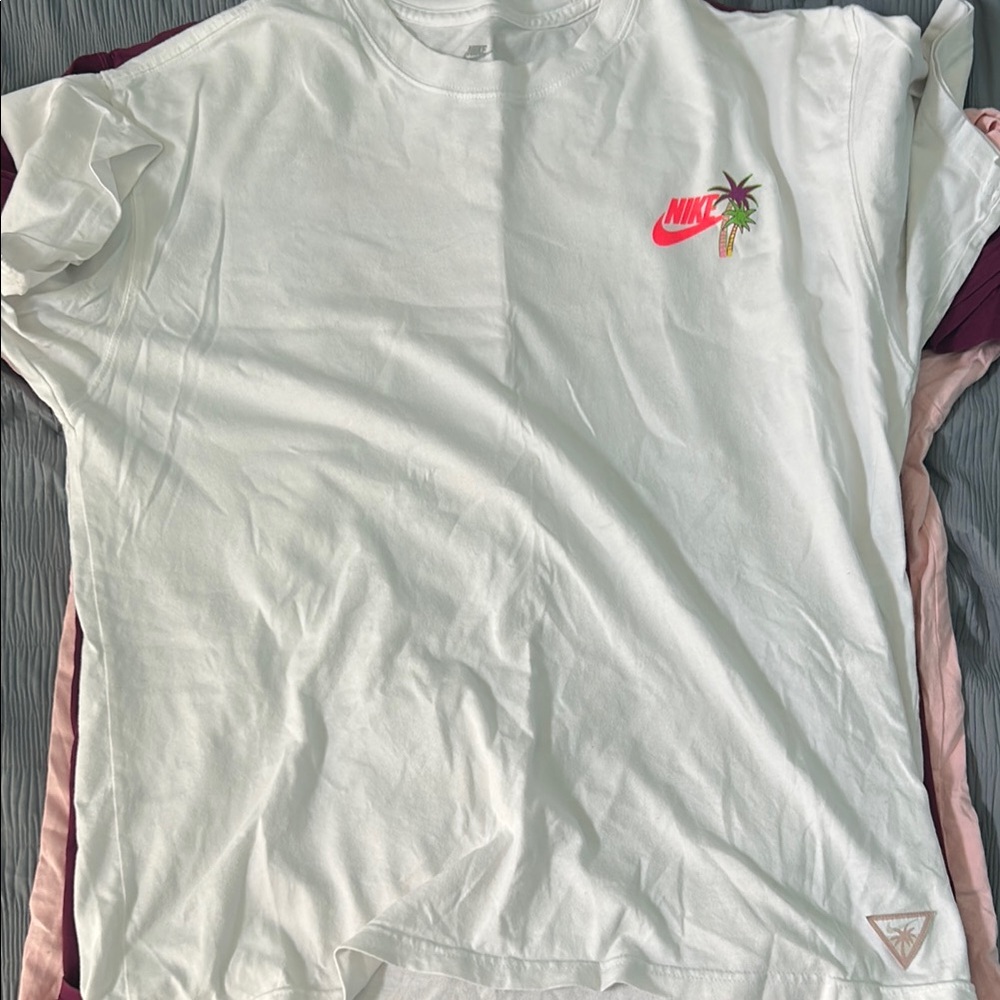Nike White Tee with Pink Logo and Palm Design